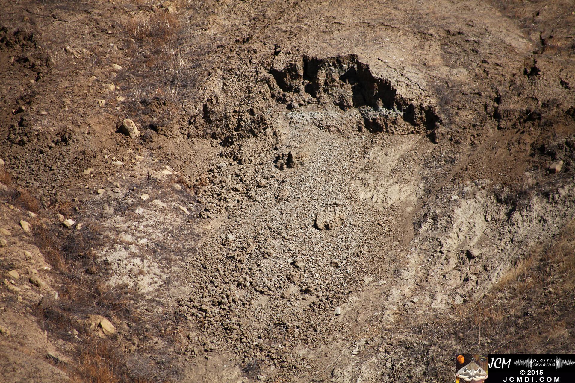 Landslide, buckled pavement, and terrain at Vasquez Canyon Road in Santa Clarita, CA filmed 11-25-2015